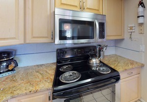 Picture Perfect Views From Every Window! Corner Unit on Sunset Beach in Treasure Island.