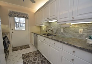 Prime Waterfront Location overlooking Moorings Bay. 7 minute walk to the beach