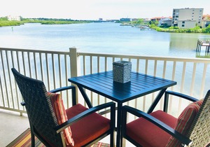 Quiet and Spacious Waterfront Condo across the street from beach!