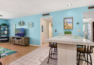 Quiet condo with a heated pool & central AC - short walk to the beach