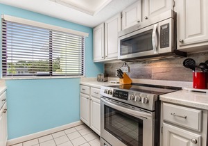 Quiet condo with a heated pool & central AC - short walk to the beach