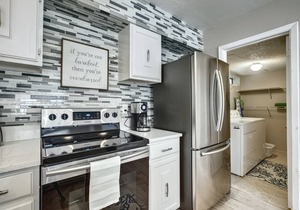 Renovated 2-Bedroom Condo | Walk to Beach | Heated Pool | Bay Views | Daily Free Activities