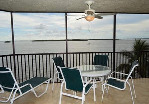 Sanibel Harbour Resort Harbour Tower 315: Relaxing while watching for dolphins in the water below.