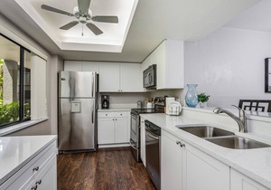 Spacious, air-conditioned condo with private W/D, beach shuttle, & central AC