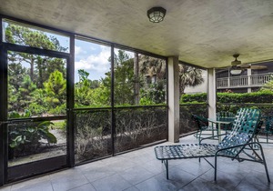 Spacious, air-conditioned condo with private W/D, beach shuttle, & central AC