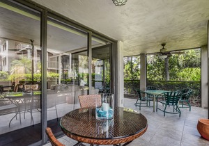 Spacious, air-conditioned condo with private W/D, beach shuttle, & central AC