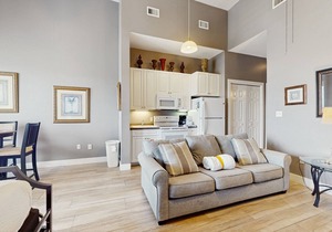 Spacious condo w/large living area, private balcony & shared pool