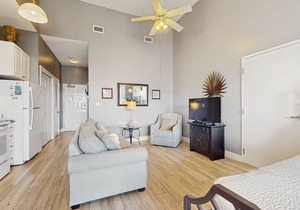 Spacious condo w/large living area, private balcony & shared pool