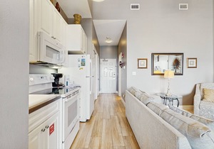 Spacious condo w/large living area, private balcony & shared pool