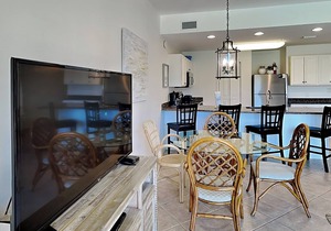 Spacious condo w. pool views + private beach access