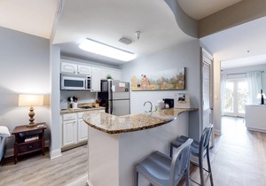 Stylish condo with lake views, bike rentals, & pools - walk to the beach
