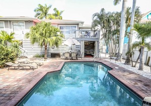 Stylish home w. tropical landscaping, private pool + hot tub