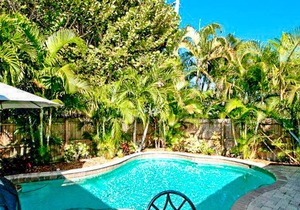 Stylish island condo w/ heated private pool & lovely views - walk to the beach