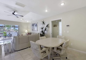 Stylish waterfront home w/ all-day sun & short walk to shopping & dining