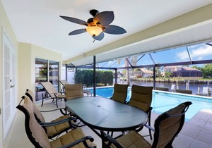Stylish waterfront home w/ all-day sun & short walk to shopping & dining