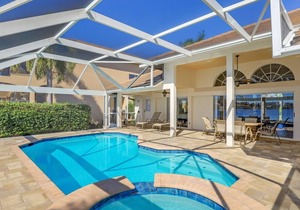Stylish waterfront home w/ spectacular view, heated pool & hot tub