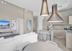 This Amazing 2-bedroom corner unit boasts breathtaking views and sleek luxuryrn design
