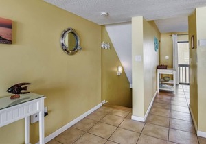 This beautifully remodeled beachfront town home Villa.