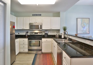 Top Floor Overlooking the Marina. Close to Johns Pass. Spacious with Two Private Balconies!