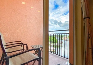 Top Floor Overlooking the Marina. Close to Johns Pass. Spacious with Two Private Balconies!
