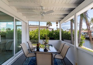 Tropical oasis with canal views. A fishing adventure near the beach!