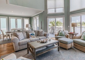 View the fairways & water all around and a slice of ocean view to boot!