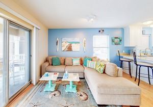 Water-view haven with sound-view balcony, shared pool, WiFi, and AC