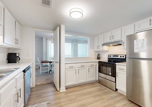Waterfront condo with balcony, views, pool & tennis