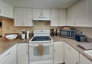 Waterfront Condo with Private Balcony, Pool, Dock Access.