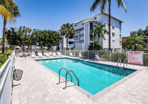 Waterfront Condo with Private Balcony, Pool, Dock Access.
