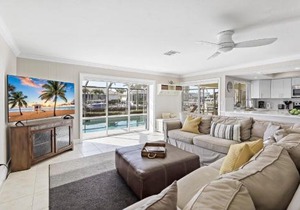 Waterfront home with pool and western exposure
