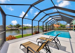 Waterfront house on key lot with unmatched water view and big heated pool