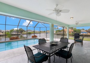 Waterfront house on key lot with unmatched water view and big heated pool