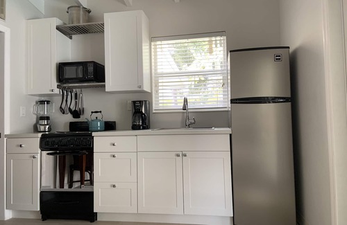 East Fort Lauderdale House | 1 Bedroom Suite in a duplex house- private heated pool for you- walk to beach