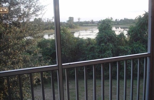 West Kissimmee Condo | 1 mile from Disney, Celebration FL, family Condo, free Wi-Fi Lake view