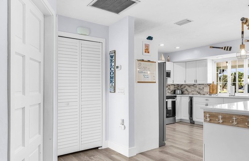 Saint James City House | 2/2 Pool Home on the Water, Boat Lift Included!