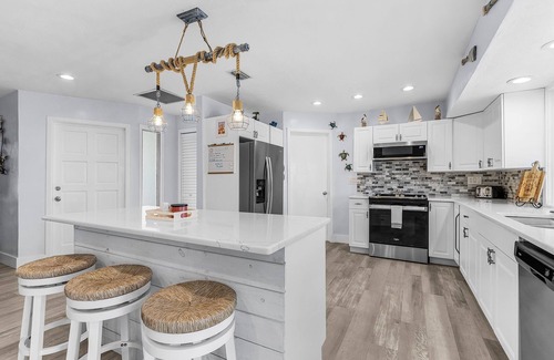 Saint James City House | 2/2 Pool Home on the Water, Boat Lift Included!