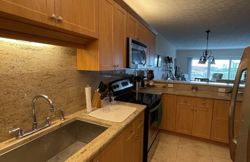 Isles of Capri Condo | 2 bdrm condo w/pool on Marco River w/Gulf views
