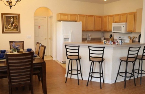 Four Corners Condo | 4 bedroom 3 bathroom pool home with water view at small gated community of High Grove Resort