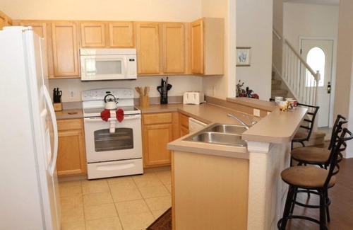 Four Corners Condo | 4 bedroom 3 bathroom pool home with water view at small gated community of High Grove Resort
