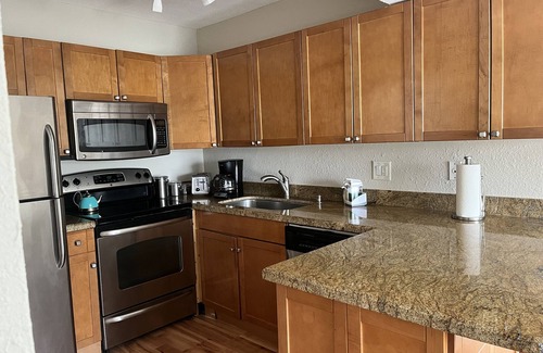 Trailer Estates Condo | Awesome first-floor Palm Aire condo close to University Town Center!