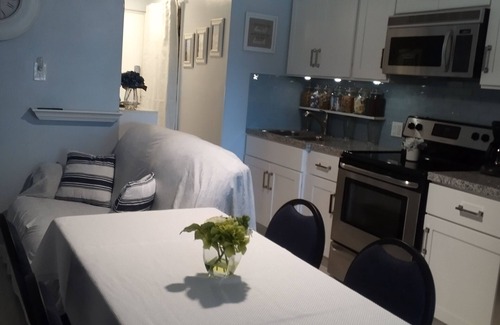 Daytona Beach Shores Condo | beach, pool, full kitchen and California king bed.