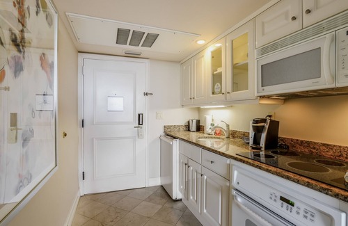 Marco Island Condo | Beachfront condo with a pool, a hot tub, central AC, & on-site restaurants