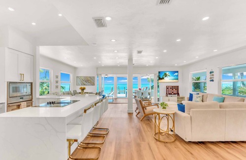 North Captiva House | “BEACHFRONT” LUXURY ISLAND HOME. PRIVATE SWIM SPA~DOCK FISHING~GolfCart STUNNING