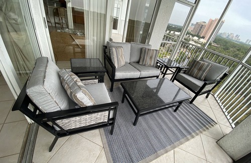 Pelican Bay Condo | Beautiful sunset views of the Gulf from this western facing 9th floor condo.