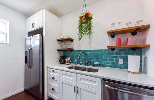 Port Canaveral House | Beautifully Renovated 4Bd/2Ba House with 2 Kitchens, short walk to the beach