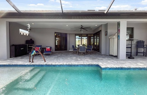 South Gulf Cove House | Brand New Luxury One Of A Kind Waterfront Home With Pool, Spa & Tiki Hut!