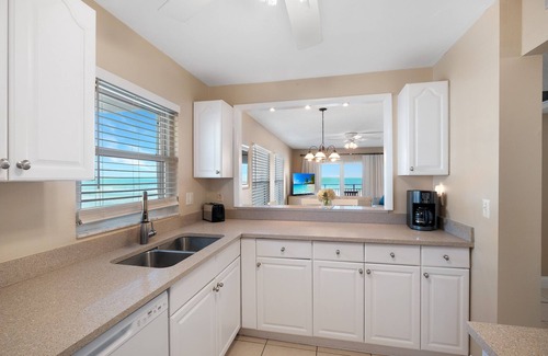 New Smyrna Beach Condo | Bright oceanfront corner condo with beach/pool views, large balcony, and multiple pools