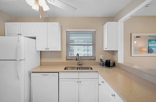 New Smyrna Beach Condo | Bright oceanfront corner condo with beach/pool views, large balcony, and multiple pools