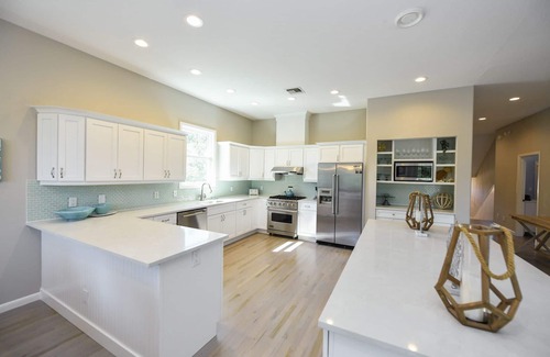 Anna Maria House | Canal front Home with Private Dock, Pool, Games, and Water Adventures